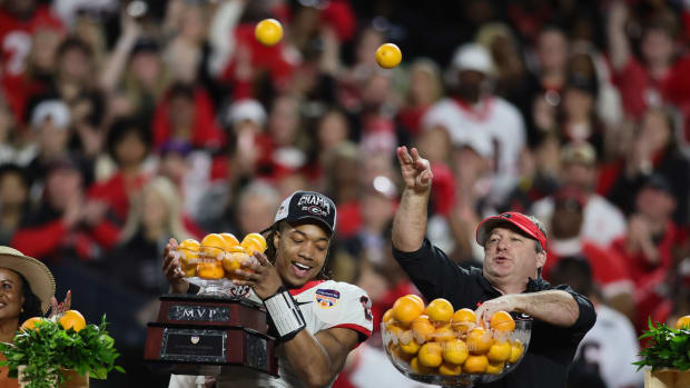 Dec 30, 2023; Miami Gardens, FL, USA; Georgia Bulldogs head coach Kirby Smart and running back Kendall Milton (2) react after the 2023 Orange Bowl at Hard Rock Stadium. (Sam Navarro / USA TODAY Sports).